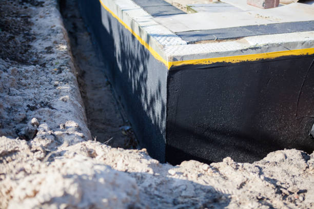 Professional Interior Drainage System technician working in Alma, MI